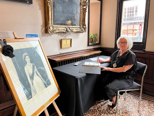 Lewes Mayor signing Book of Condolence