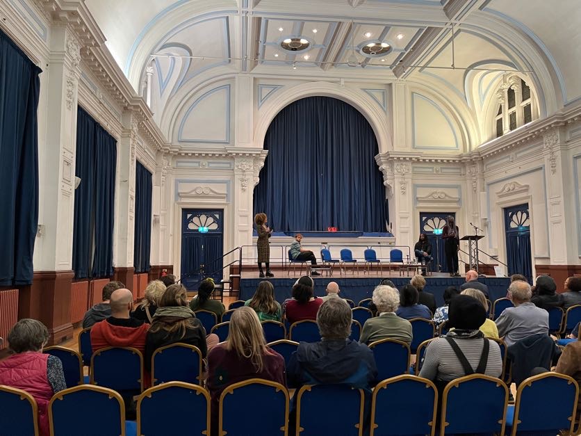 Poets Priss Nash and Aflo the Poet reciting their poem Wake Up at Lewes Town Council's Black History Month 2022 event at Lewes Town Hall